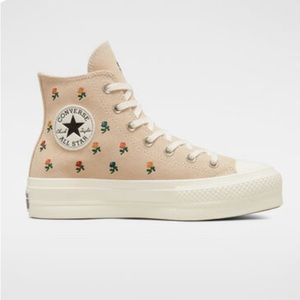 new pair of platform converse never been worn!